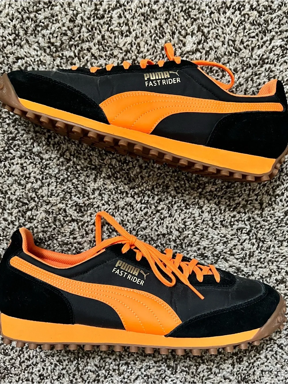 Puma Black and Bright Orange Fast Rider sneakers size 10.5 men’s